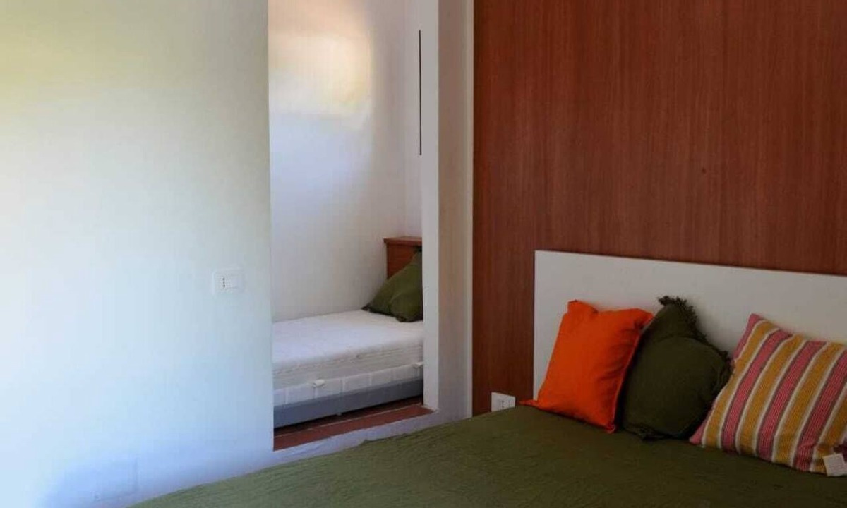 S'oru e Mari Apartment | A delightful section of a villa surrounded by greenery and just a stone's throw from the sea