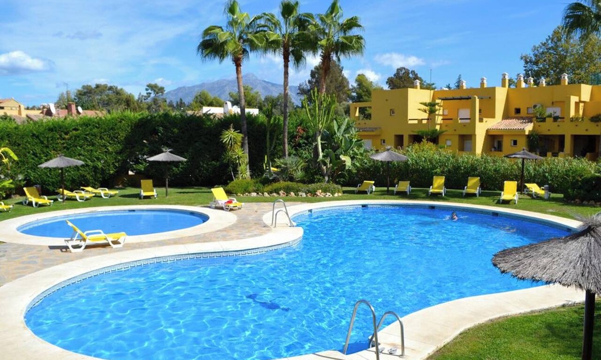 Guadalmina Apartment | Homerez - Elegant Apartment in Marbella, Pool