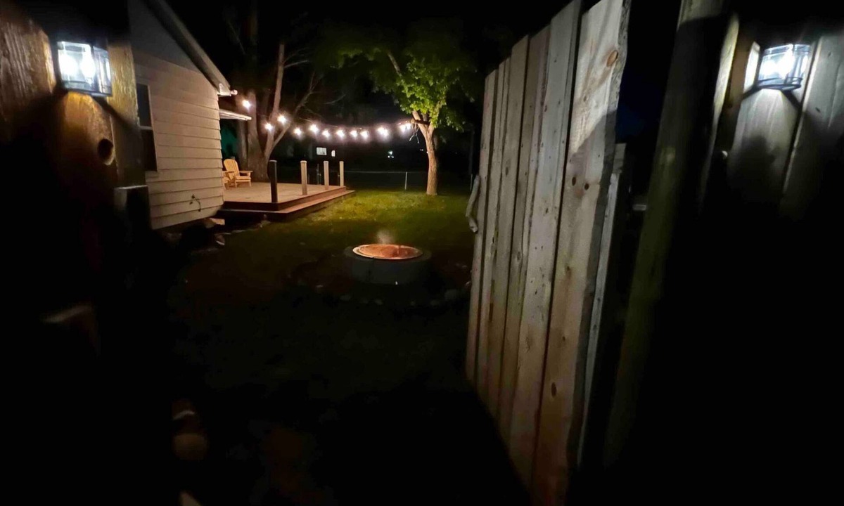 Lander House | Quiet neighborhood, relaxing wrap around deck with fire pit. Short walk to town.