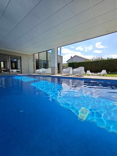 Sanxenxo House | Sanxenxo Casa Rial 47 con PISCINA CLIMATIZADA