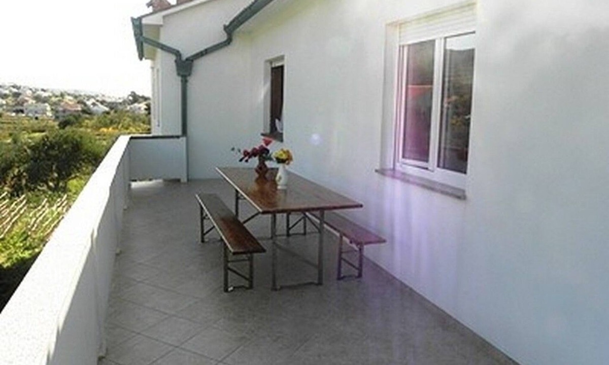 Banjol Apartment | Three bedroom apartment with terrace and sea view Banjol, Rab (A-16645-b)