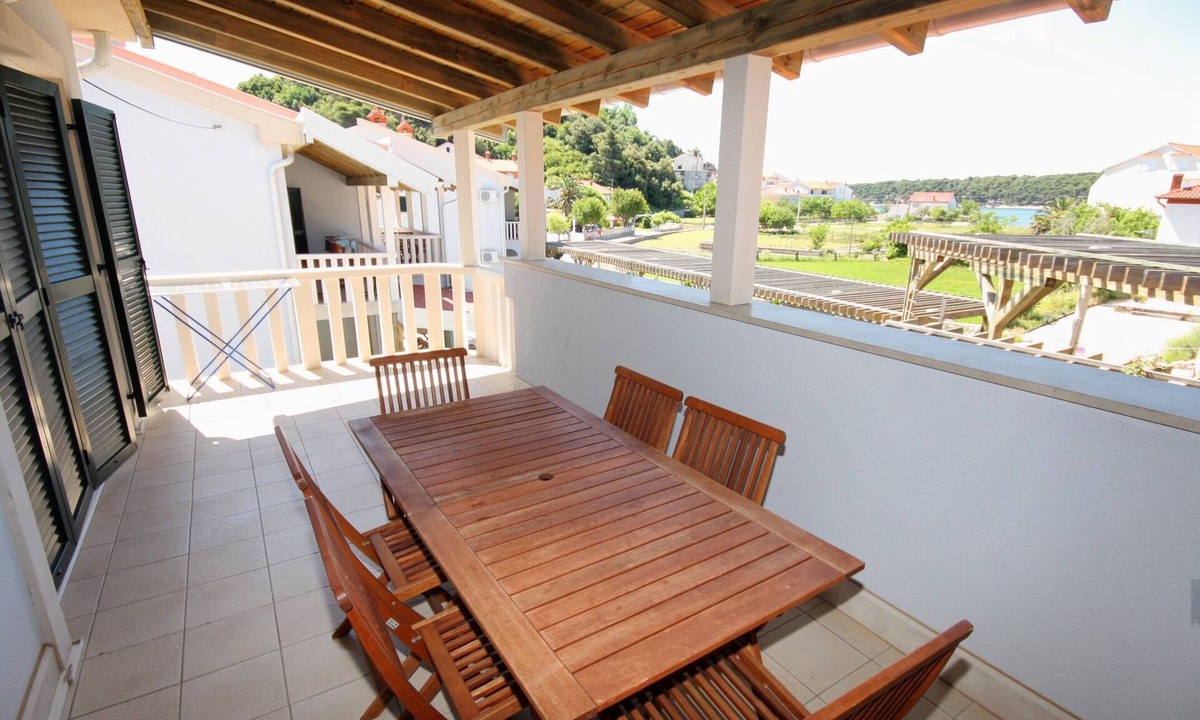Kampor Apartment | Two bedroom apartment with a swimming pool Palit, Rab (A-3212-c)