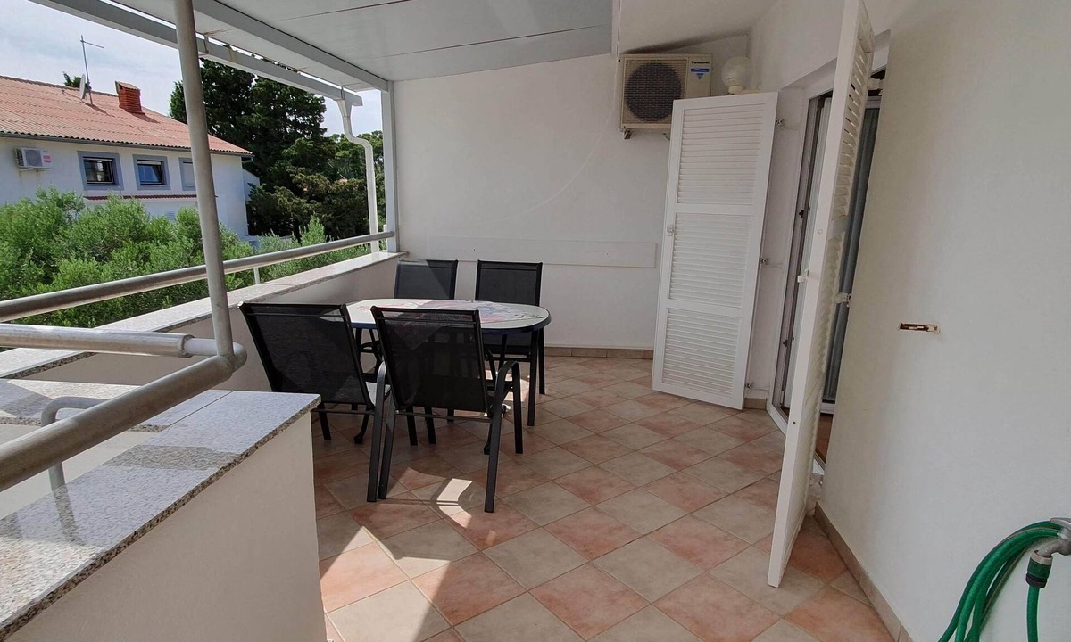 Banjol Apartment | Two bedroom apartment with terrace and sea view Rab (A-14792-a)