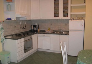 Holiday apartment with air conditioning and balcony
