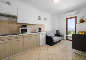 Holiday apartment with sea view and pool