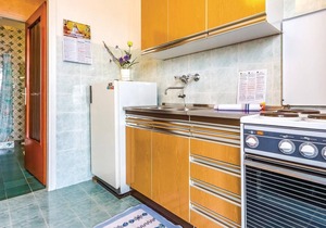 In the beautiful bay Grabrova is located this house with three smaller apartments (CKC931-933).