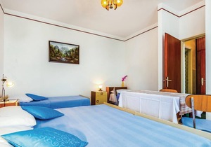 In the beautiful bay Grabrova is located this house with three smaller apartments (CKC931-933).