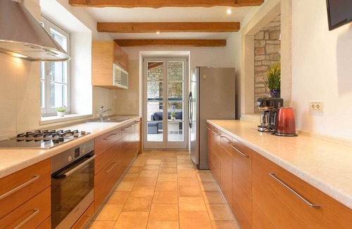 Divsici Villa | A traditional, stone villa in Marčana with a pool and children's playground