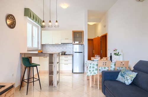 Galizana Apartment | Affordable apartment with stylish interior, baby crib, playground