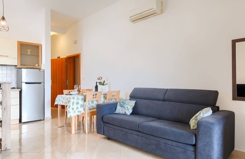 Galizana Apartment | Affordable apartment with stylish interior, baby crib, playground