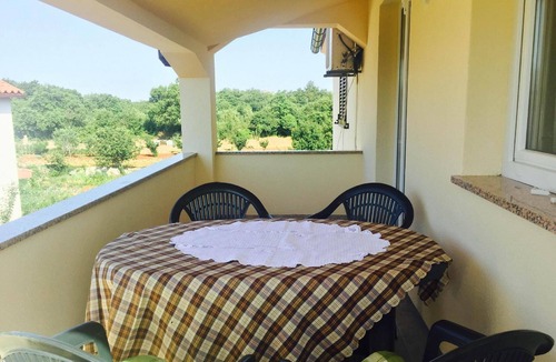 Pinezici House | Apartment Fuma with a private balcony