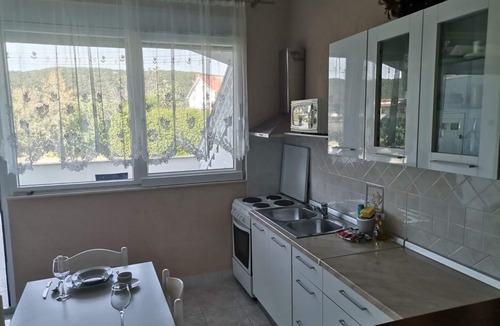 Supetarska Draga Apartment | Apartment Mig - with beautiful garden: A1(2+1) - Supetarska Draga, Island Rab, Croatia