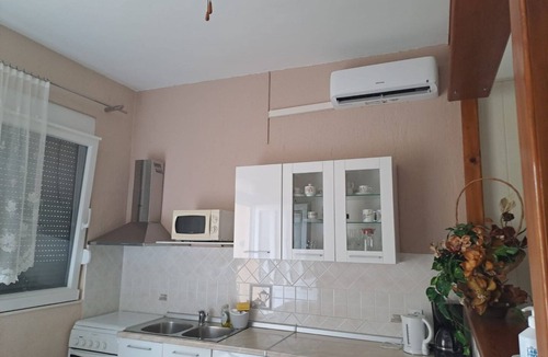 Supetarska Draga Apartment | Apartment Mig - with beautiful garden: A1(2+1) - Supetarska Draga, Island Rab, Croatia