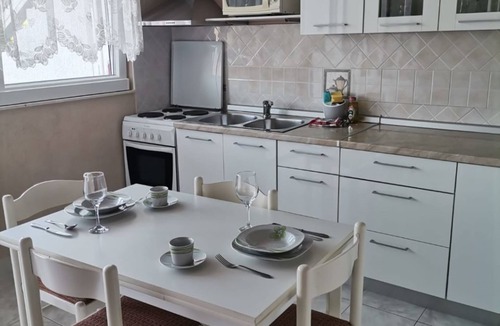 Supetarska Draga Apartment | Apartment Mig - with beautiful garden: A1(2+1) - Supetarska Draga, Island Rab, Croatia