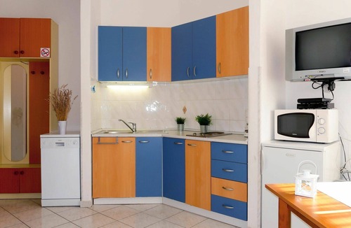 Sveti Vid Dobrinjski Apartment | Beautiful apartment for 4 guests with A/C, pool, WIFI, TV, patio and pets allowed