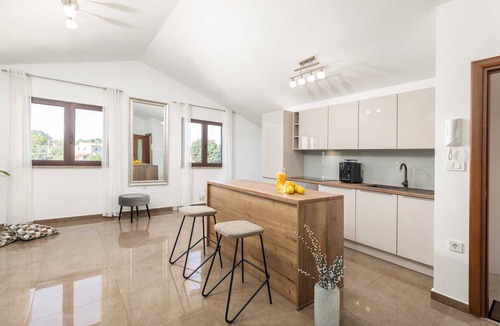 Loborika Villa | Charming 6-BR Villa for 12 with a pool, Dual Living Areas, 5 Parking Spaces
