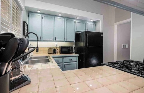 Lansing House | Dinner and a Movie | 2 BR & 1 BA | Lansing Home