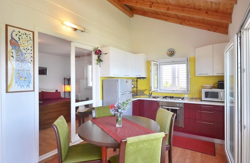 Postira Apartment | Fantastic view, right by the sea, pets welcome