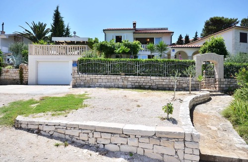 Postira Apartment | Fantastic view, right by the sea, pets welcome