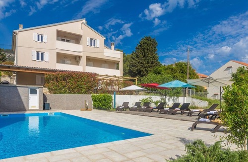 Nerezine Apartment | Holiday apartment NAYA with large heated pool (50m2) in Nerezine, beautiful beach with crystal-clear sea