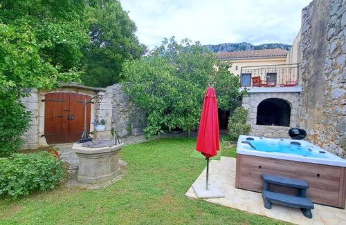 Grizane House | Lovely three-bedroom villa with a serene garden, offering privacy and comfort.