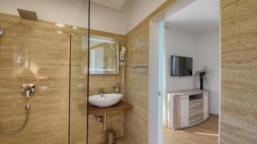 Pjescana Uvala Villa | Luxury villa with sea view, pool and jacuzzi near the beach in the town of Pula by WiiBuk