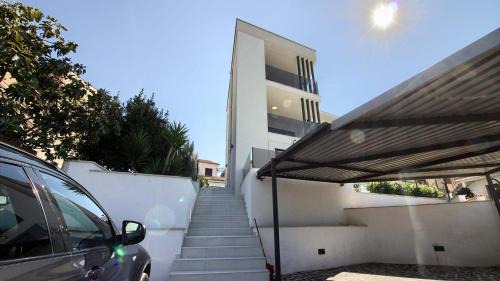 Pjescana Uvala Villa | Luxury villa with sea view, pool and jacuzzi near the beach in the town of Pula by WiiBuk