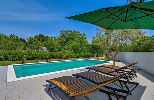 Krnica House | Modern house in a quiet location with a fenced garden, porch and private pool