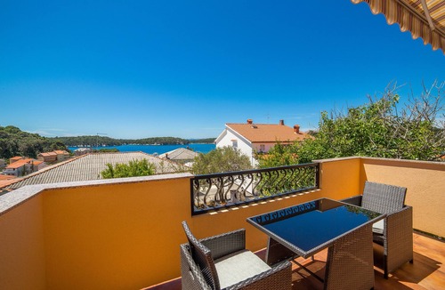 Supetarska Draga Condo | Nice and fresh two with sea views, large balcony and pool access.