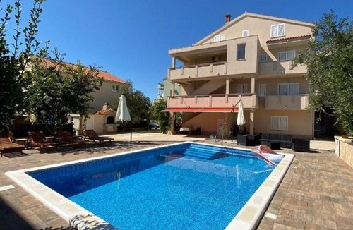 Novalja Apartment | One bedroom apartment with a swimming pool Novalja, Pag (A-211-f)