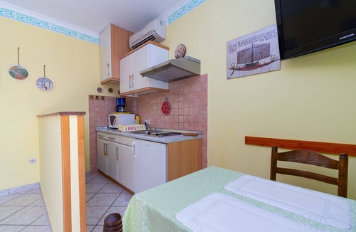 Palit Apartment | One bedroom apartment with terrace and sea view Rab (A-14120-a)