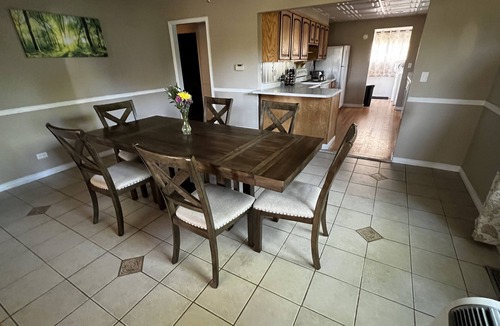 Lander House | Quiet neighborhood, relaxing wrap around deck with fire pit. Short walk to town.