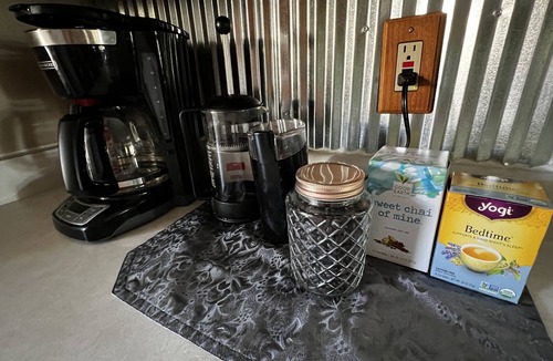 Lander House | Quiet neighborhood, relaxing wrap around deck with fire pit. Short walk to town.