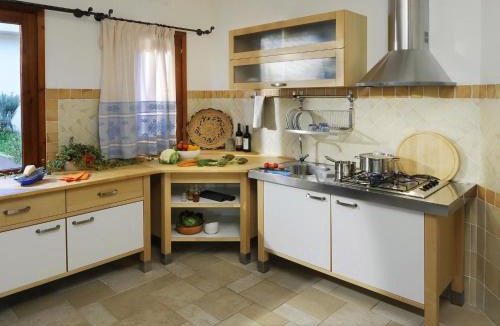 Santa Margherita di Pula Apartment | Residence with swimming pool close to the sea