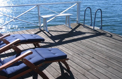 Akersberga Cottage | Seaside century house with beautiful sunset and big jetty with sauna