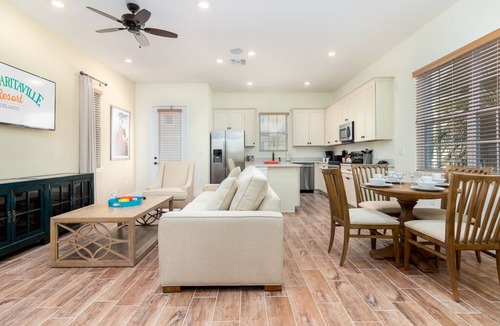 West Kissimmee House | Sunny Margaritaville Cottage - Fully Equipped Kitchen, Welcoming Living Area