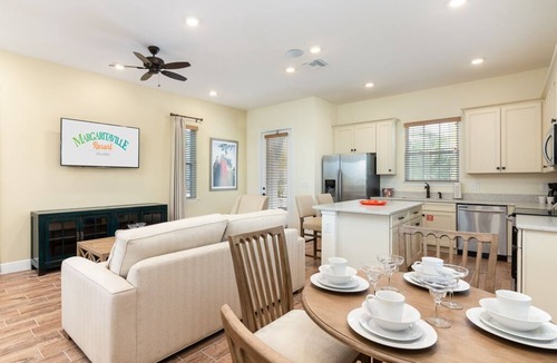 West Kissimmee House | Sunny Margaritaville Cottage - Fully Equipped Kitchen, Welcoming Living Area