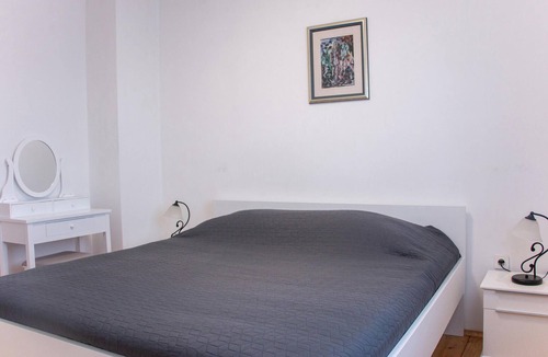 Gondolici Apartment | This functionally furnished apartment is located on a hill with a beautiful view of the sea and the
