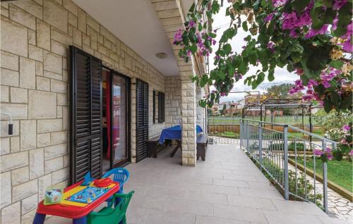 Pomer Apartment | Three-Bedroom Apartment In Medulin
