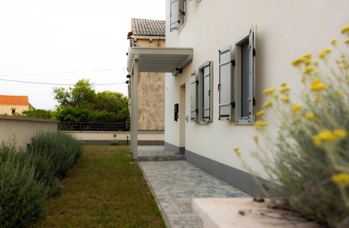Mali Losinj Apartment | Two bedroom apartment with terrace and sea view Sveti Jakov, Lošinj (A-24153-a)