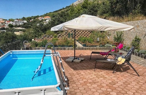 Stanici Apartment | Two bedroom apartment with a swimming pool Stanići, Omiš (A-18676-a)