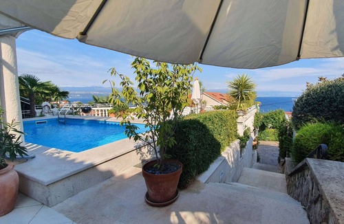 Lovran Apartment | Two bedroom apartment with a swimming pool Lovran, Opatija (A-14178-b)