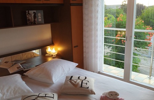 Kampor Apartment | Two bedroom apartment with a swimming pool Kampor, Rab (A-16865-a)