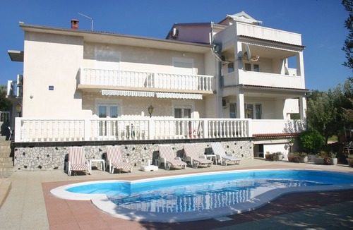 Barbat na Rabu Apartment | Two bedroom apartment with a swimming pool Barbat, Rab (A-4951-c)