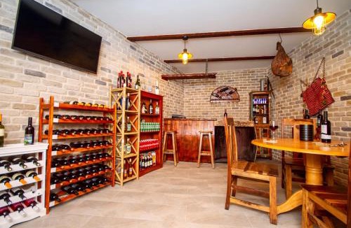 Lokva Rogoznica Villa | Villa MIRNA with heated pool & whirlpool, traditional wine bar, 150m from sea