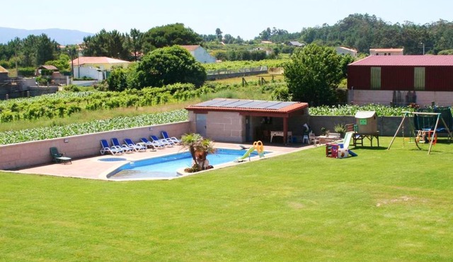 4 bedrooms house with shared pool jacuzzi and enclosed garden at Sanjenjo