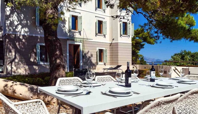 A beachfront villa with a sauna and a gym