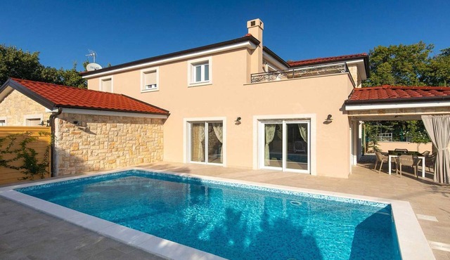 A modern poolside villa on the island Krk