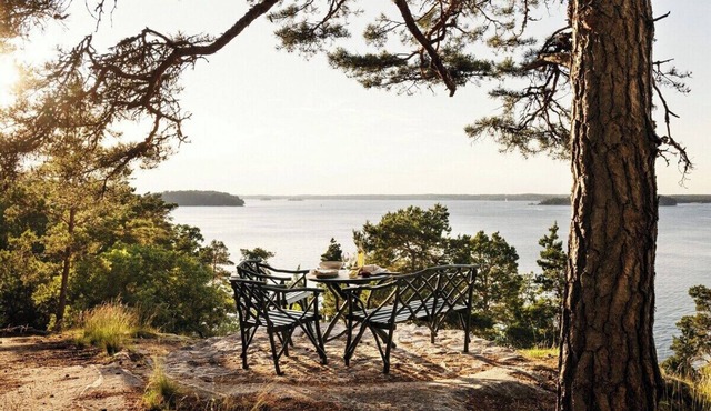 A restored 1911 waterfront estate on Skarpö — 7 bedrooms, private dock, and wood-fired sauna