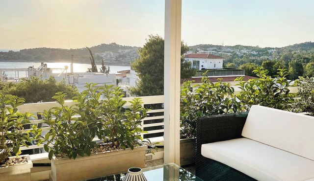 A unique 3 level penthouse with a great sea view to Vouliagmeni Bay